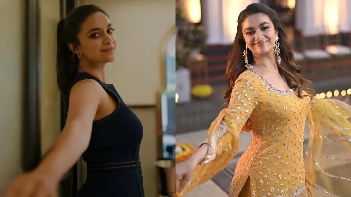 Keerthy Suresh greeting fans and posing for photos at an airport terminal in London