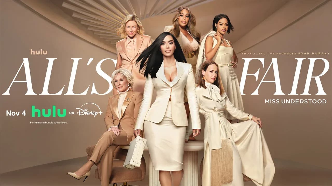Kim Kardashian in character as Allura Grant, standing in front of a glass office building, looking intense.