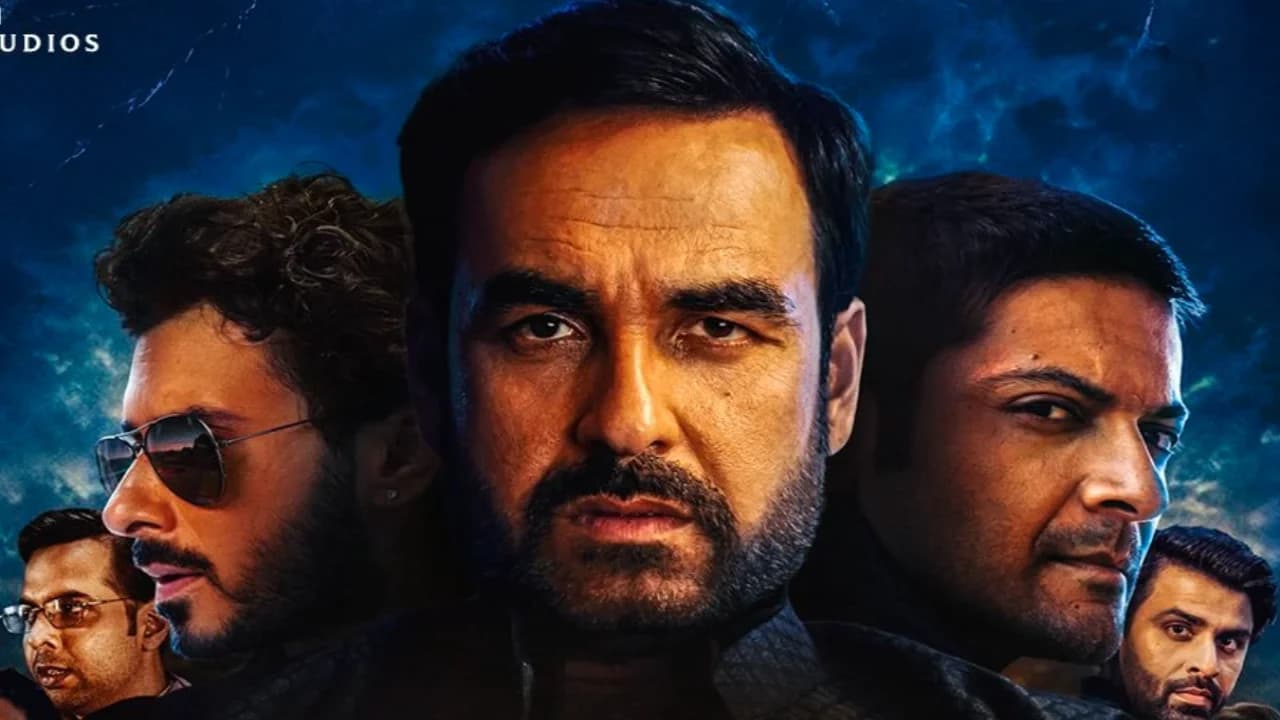 Poster or still from Mirzapur: The Movie featuring Kaleen Bhaiya in a tense confrontation scene