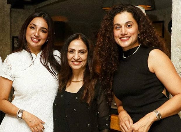 Taapsee Pannu and Kanika Dhillon standing together at a Netflix‑hosted celebration for the film Gandhari