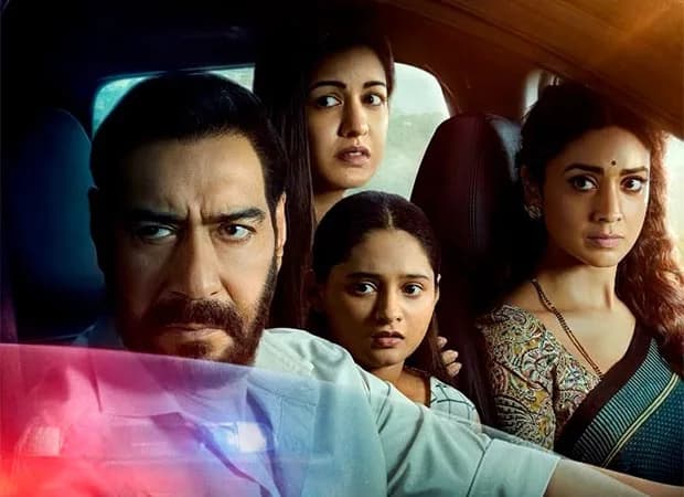 Ajay Devgn as Vijay Salgaonkar on the Drishyam 3 poster, staring intensely against a dark background
