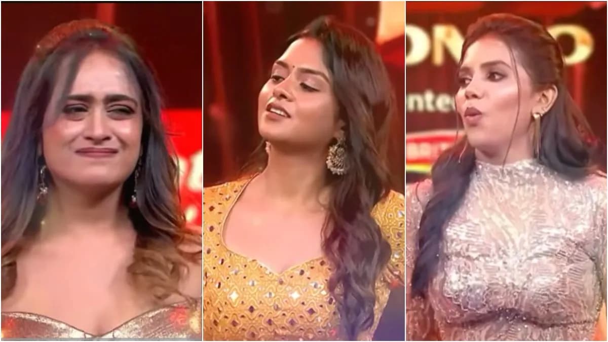 Vijay Sethupathi standing on the Bigg Boss Tamil stage with three actresses during the season 10 premiere elimination twist