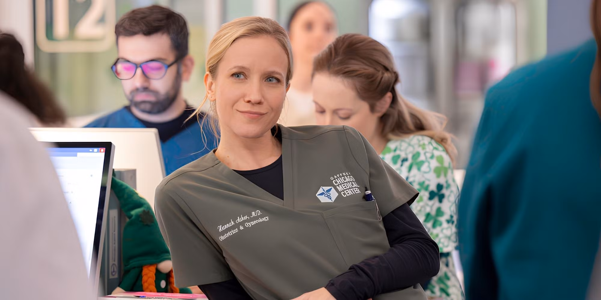 Jessy Schram as Dr. Hannah Asher and Steven Weber as Dr. Dean Archer in the Chicago Med emergency department