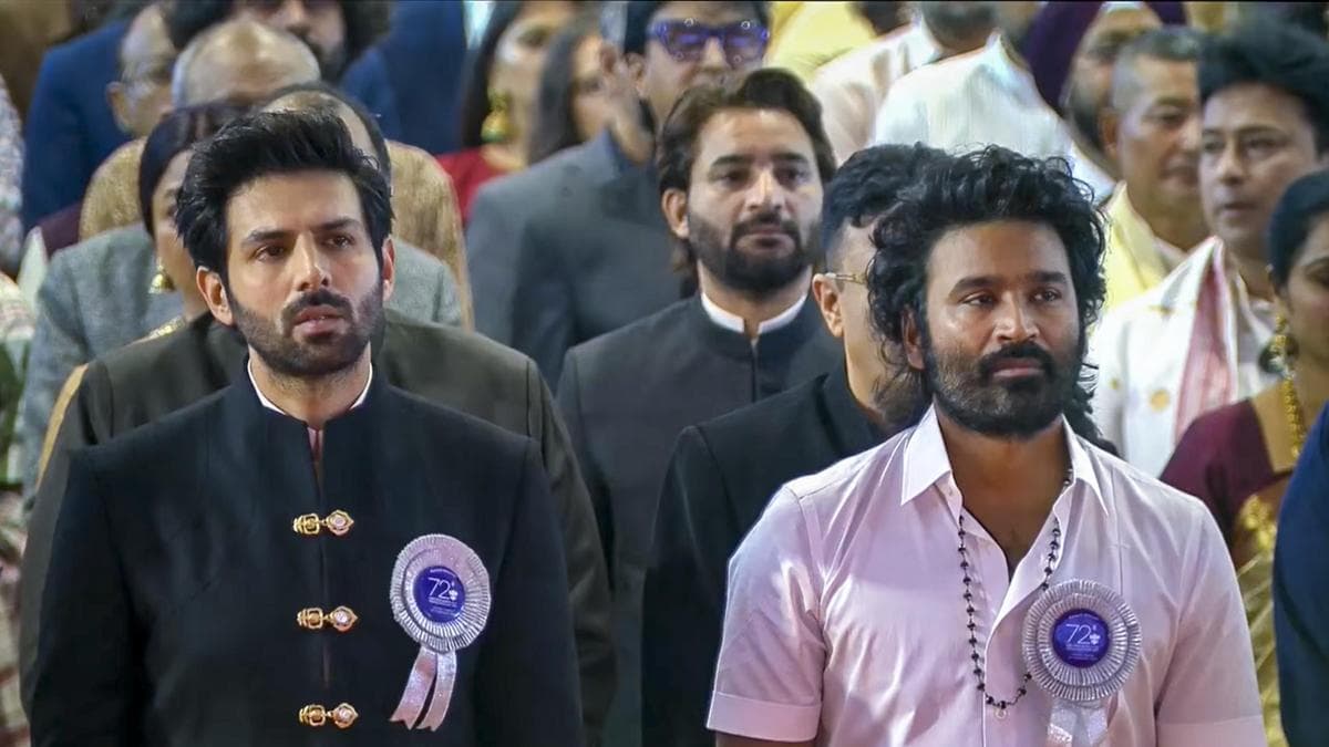 Kartik Aaryan receiving the Best Actor National Film Award on stage in Gujarat, presented by President Droupadi Murmu