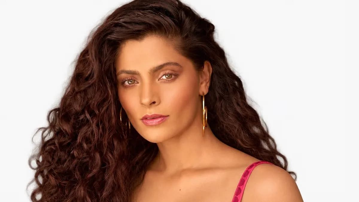 Saiyami Kher crossing the finish line of an Ironman triathlon