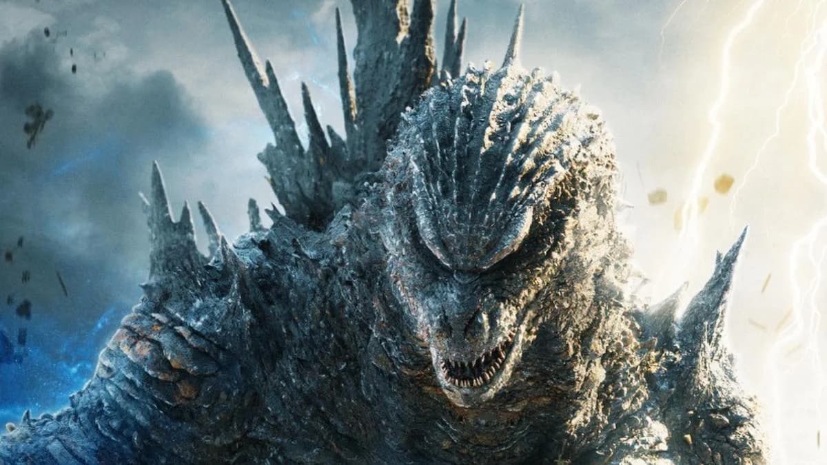A shadowy Godzilla silhouette looms over a ruined city skyline, lit by flickering emergency lights. The title 'Godzilla Minus Zero' appears in bold, cracked text.