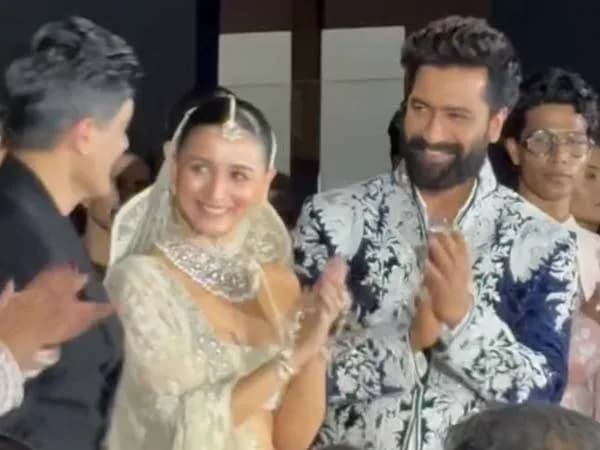 Alia Bhatt and Vicky Kaushal pose in elaborate ethnic couture on the runway at the 15th Mijwan fashion show, Mumbai, September 26 2026