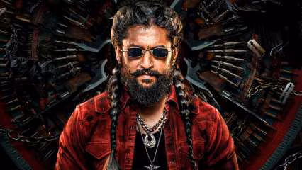 Poster of Nani’s film The Paradise showing the actor in 1980s Secunderabad attire with a backdrop of tribal motifs.