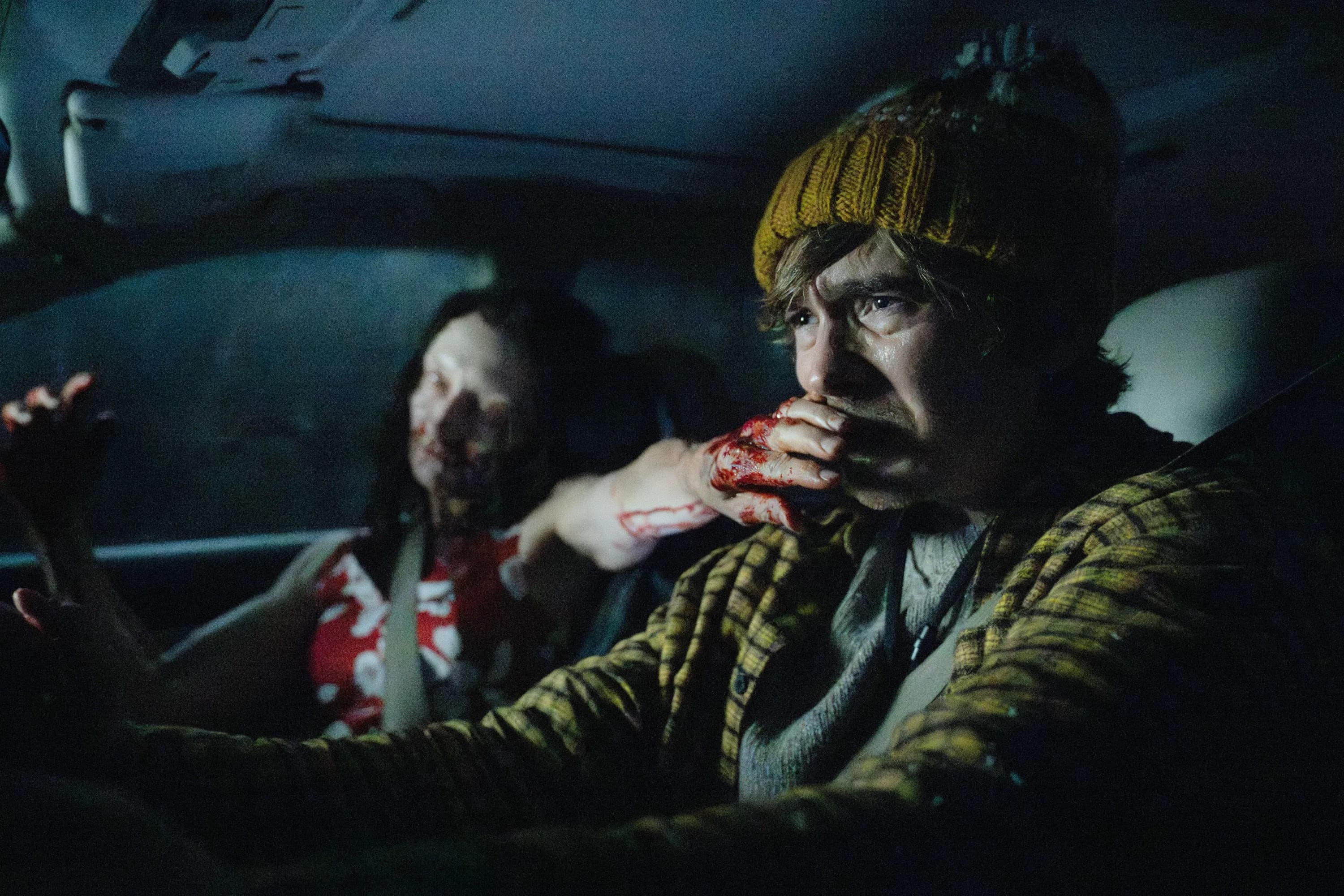 A promotional still from Zach Cregger's Resident Evil reboot showing a tense scene from the film