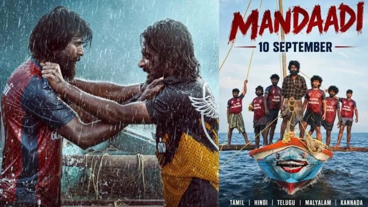 Soori in a still from the Tamil film Mandaadi, set against a fishing village backdrop with a country boat race.