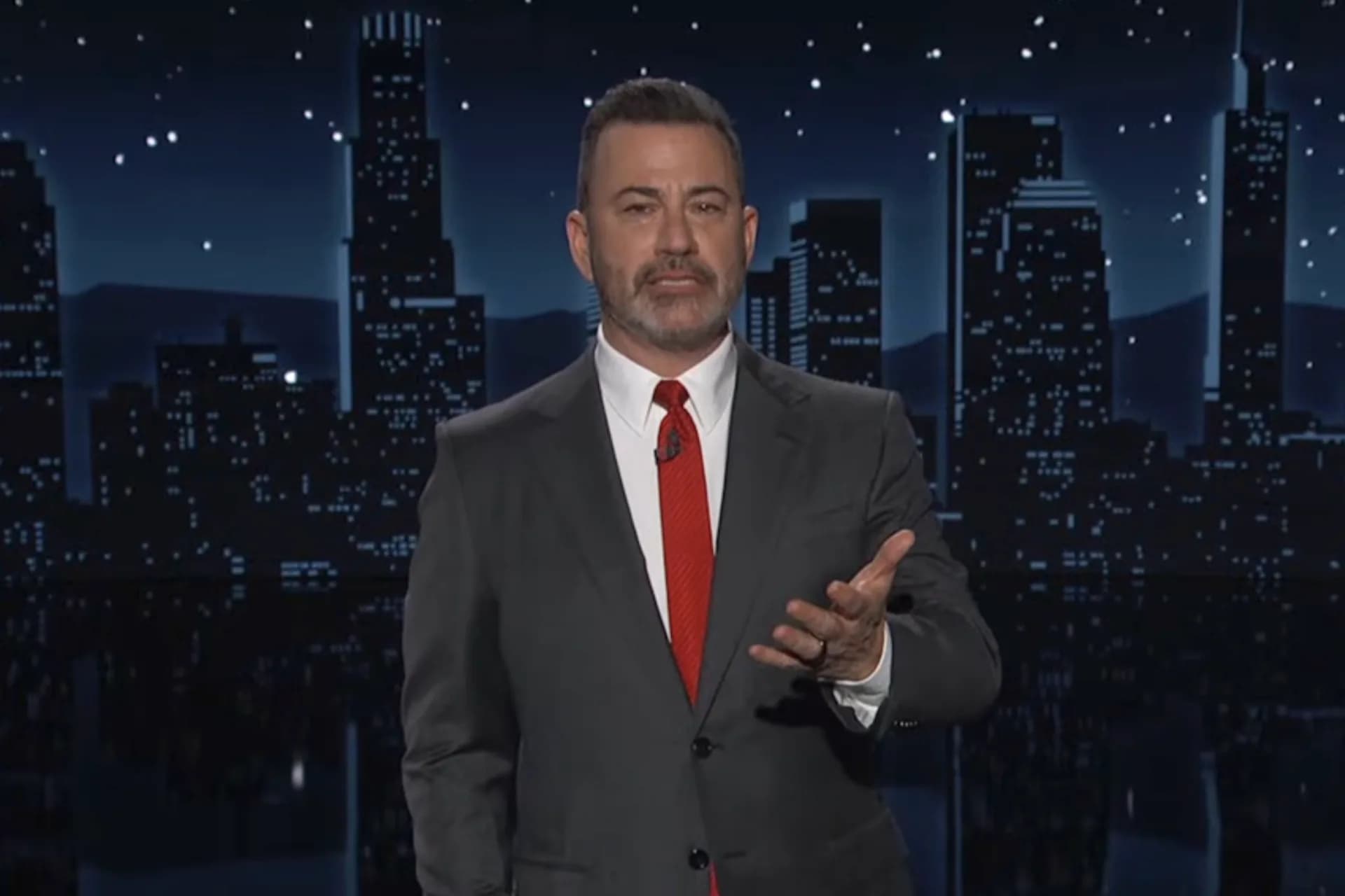 Jimmy Kimmel speaking during his monologue at the desk of Jimmy Kimmel Live in the ABC studio.