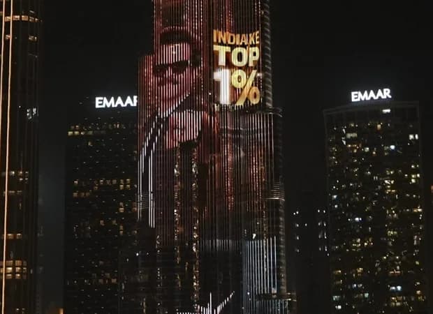 Dubai's Burj Khalifa lit up at night displaying visuals from Anil Kapoor's game show India Ke Top 1%.