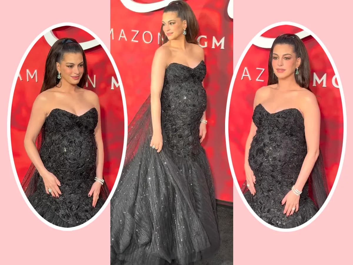 Anne Hathaway in a strapless black Prada gown with a tulle mermaid skirt on the red carpet at the Verity premiere in New York City.