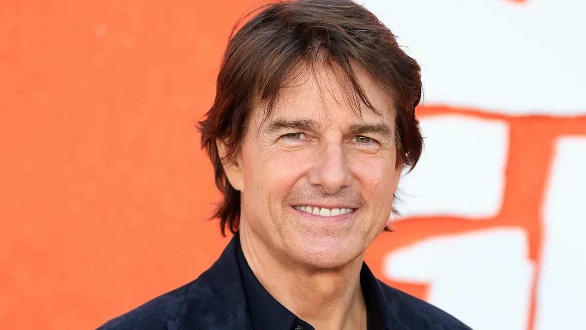 Tom Cruise in a dark suit greeting fans outside the Digger premiere at Directors Village in Los Angeles