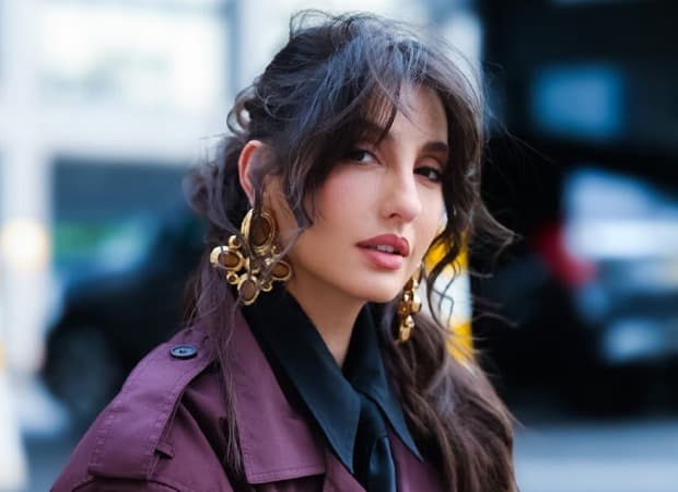 Nora Fatehi speaking on a podcast about her decision to move to India at age 22