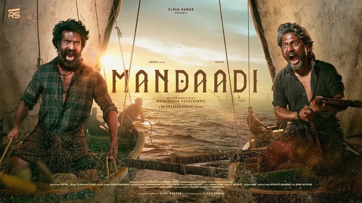 Soori in a still from the Tamil film Mandaadi, dressed for a boat race sequence