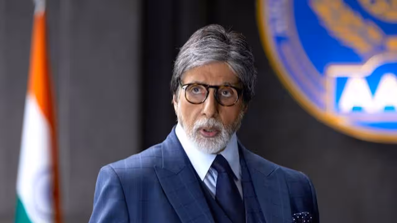 Amitabh Bachchan in a black suit, standing in front of a courtroom building, looking serious.