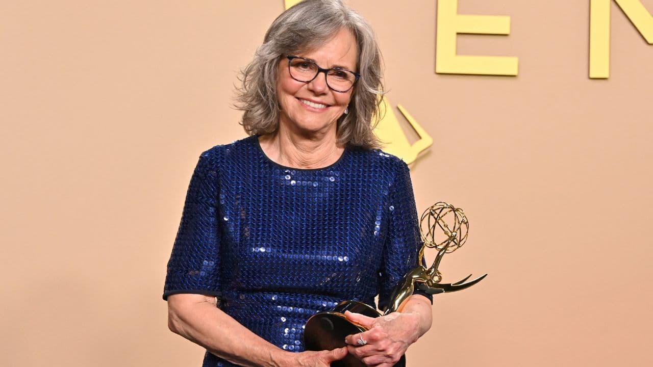 Sally Field holding her Emmy award on stage at the 2026 Primetime Emmy Awards