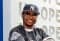 Trey Songz poses with his son Noah on the red carpet at a children's fashion show