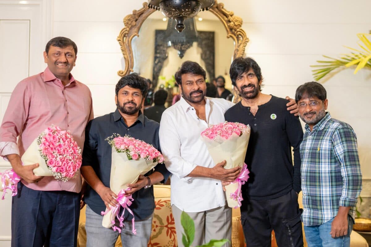 Chiranjeevi and Ram Charan pose with Ravi Teja, director Shiva Nirvana and the Irumudi producers at a celebratory meeting
