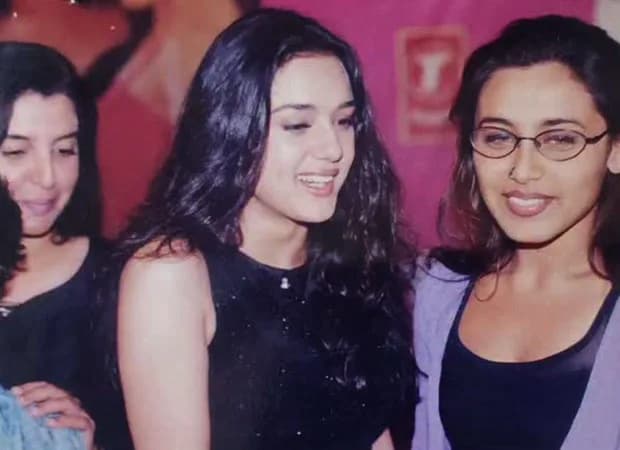 Farah Khan posing with Rani Mukerji, Preity Zinta, and Manisha Koirala on a film set, smiling at the camera.