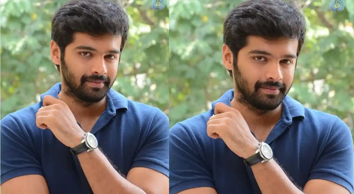 Trigun from Bigg Boss Telugu 10 looking into the camera with a confident expression