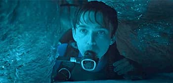 A scene from the Whalefall trailer showing Austin Abrams as Jay Gardiner inside the dark, cavernous interior of a sperm whale's stomach.
