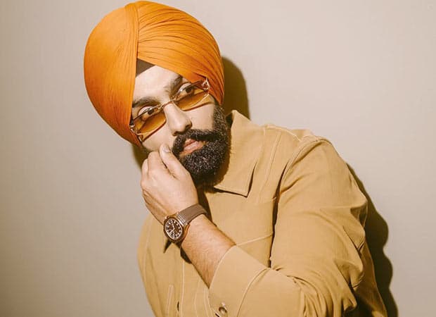 Punjabi singer and actor Ammy Virk performing on stage during his Canada tour.