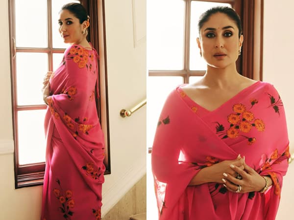 Kareena Kapoor Khan wearing a pink floral saree with flowers in her hair at a Delhi press event for Daayra.