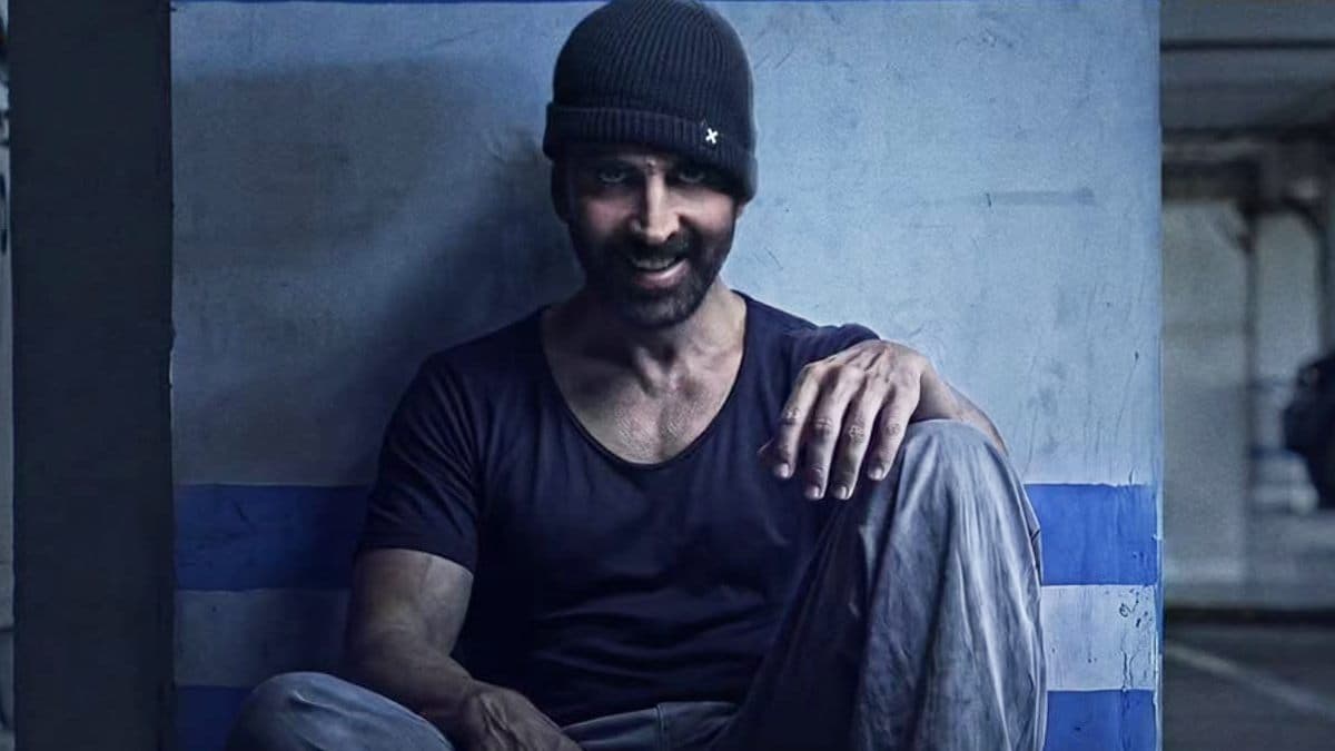 Akshay Kumar in a promotional still, with box office numbers referenced in text overlay