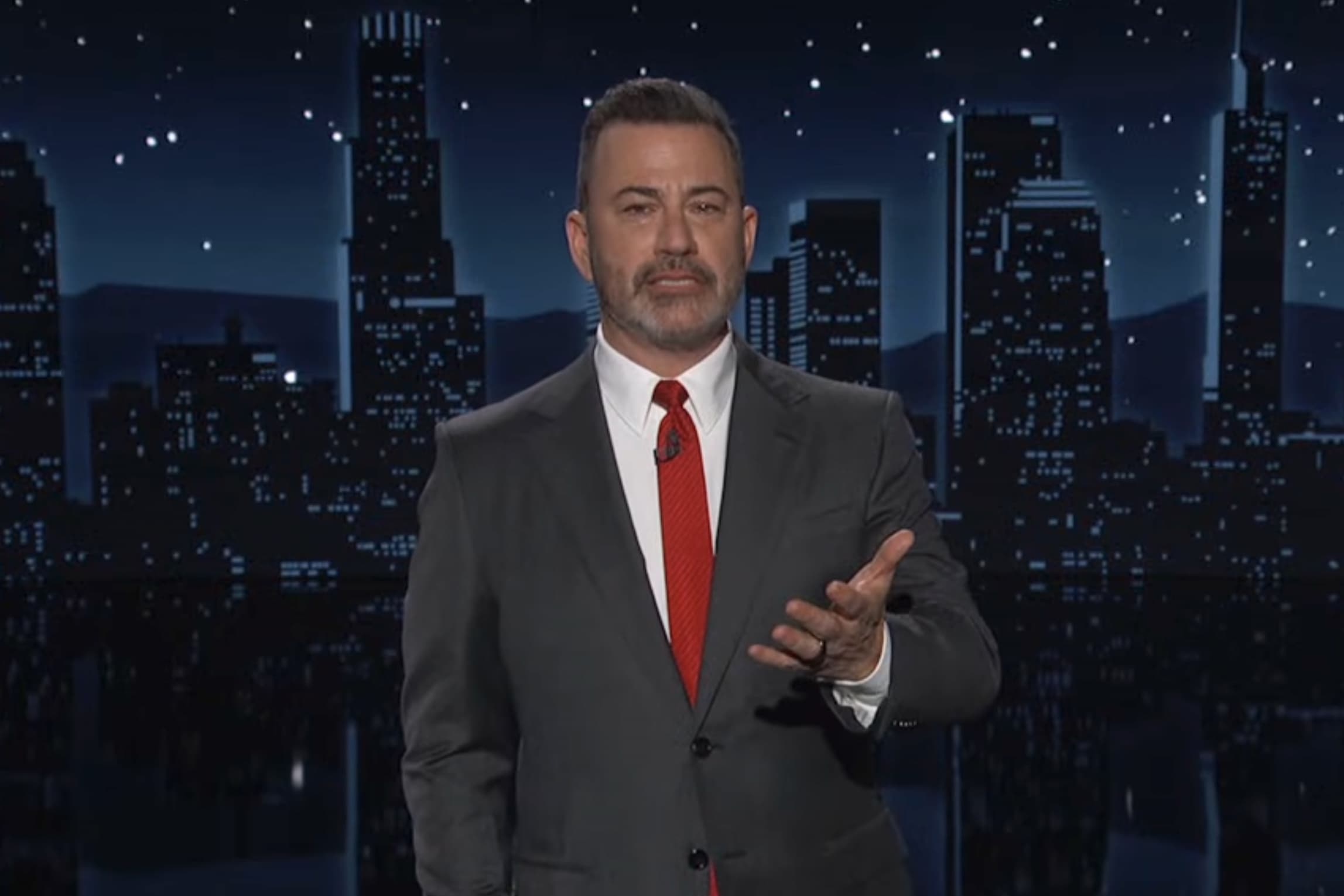 Jimmy Kimmel speaking during his monologue at the desk of Jimmy Kimmel Live in the ABC studio.
