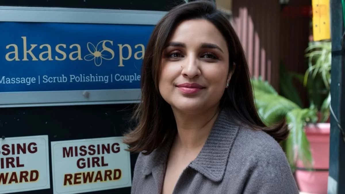 Parineeti Chopra in a tense scene from Shaque, eyes sharp, face strained under dim light.