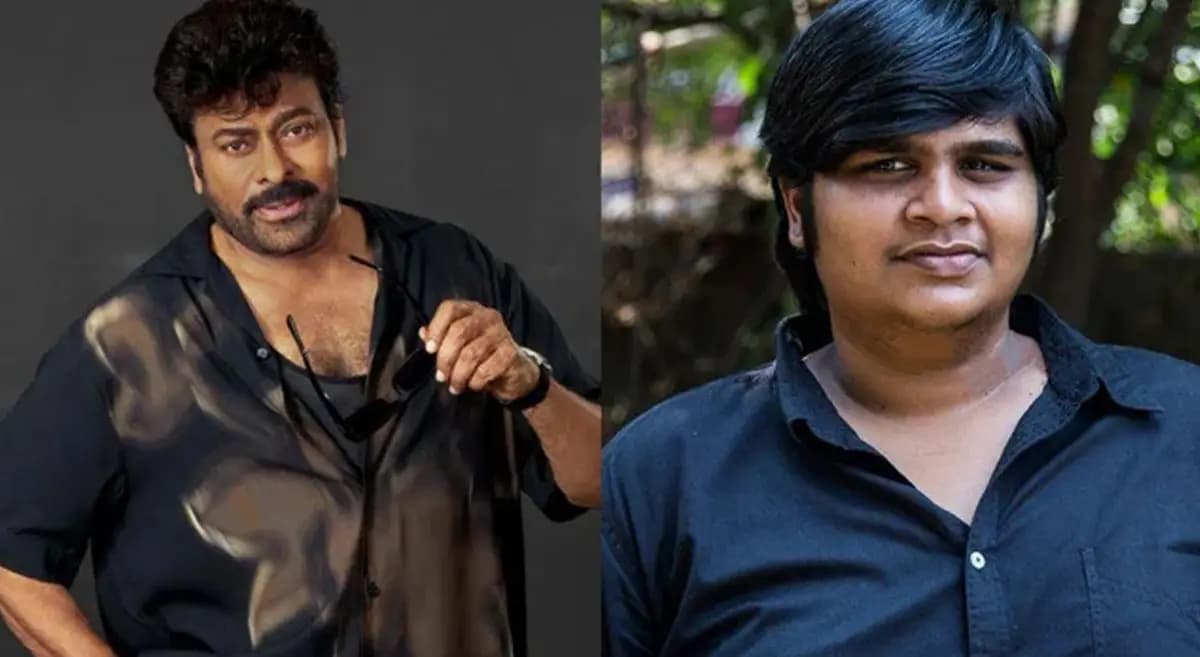 Karthik Subbaraj and Chiranjeevi standing together at a film event