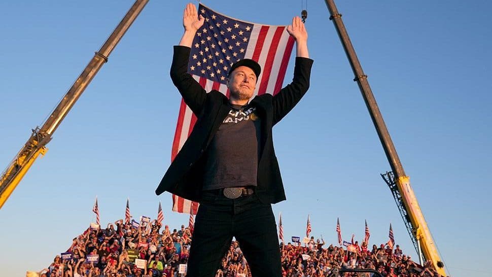 Elon Musk speaking at a public event, with a still from Alex Gibney's documentary Musk shown at its Venice Film Festival premiere.
